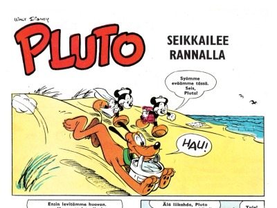 Pluto seikkailee rannalla